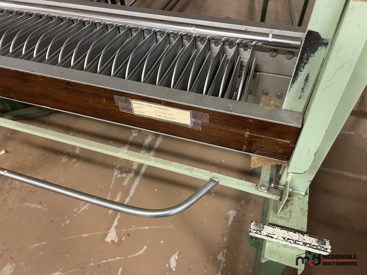 Hanger/Folder Machine