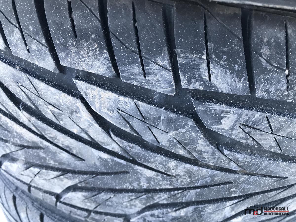 Set of (4) Toyo Tires on (4) Tezzen Rims